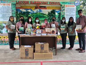 CE Basic Ed Dept donates books to Lacong Elementary School